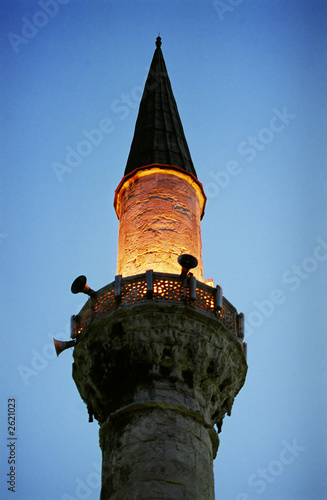 minaret on the  mosque by night