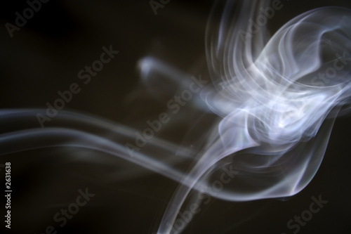 puff of aroma smoke on a dark background