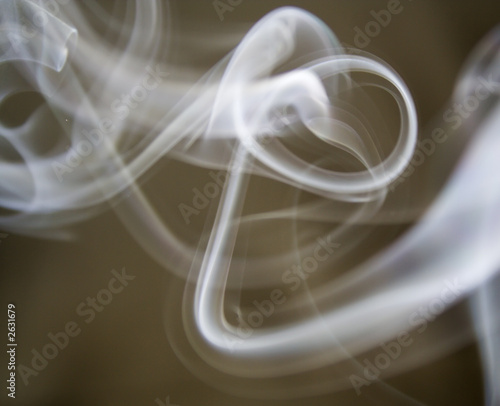 puff of aroma smoke on a dark background