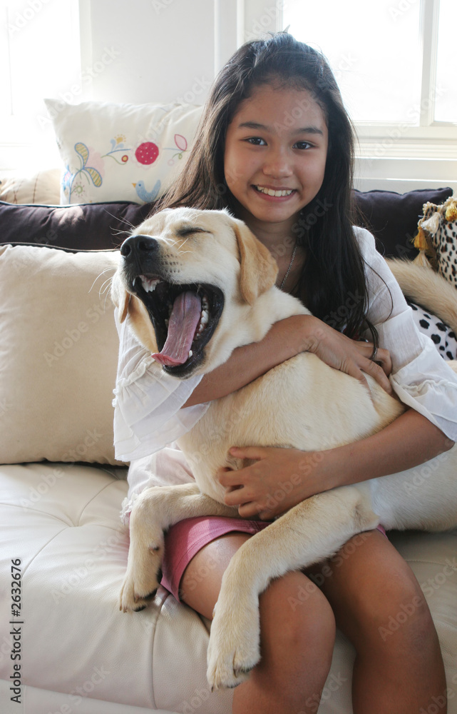 asian girl with her yawning dog