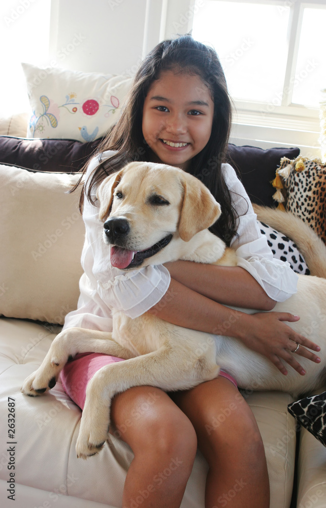 happy asian girl with her pet dog