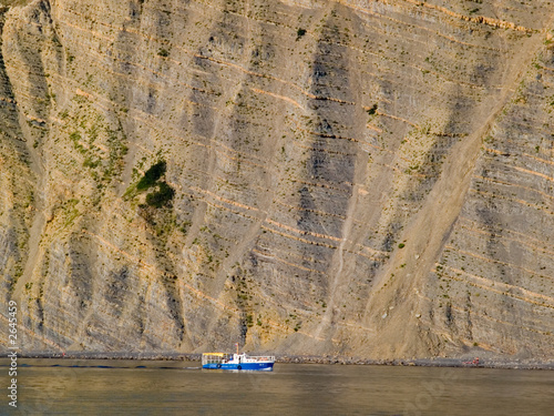 ship on a background of a high cliffs
