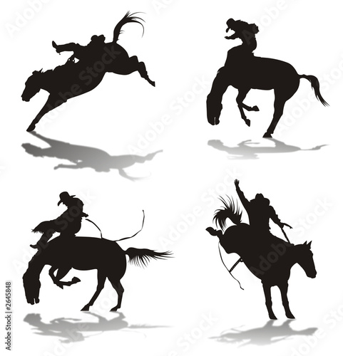 silhouettes of cowboys