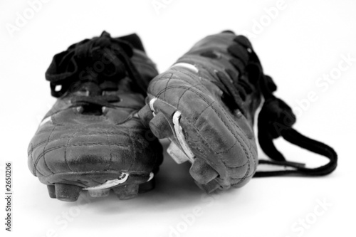 cleats in black and white photo