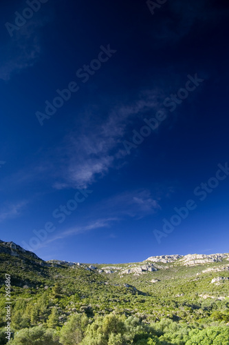 blue sky over the rocks mountain photo