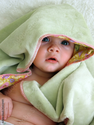 baby with blanket on head