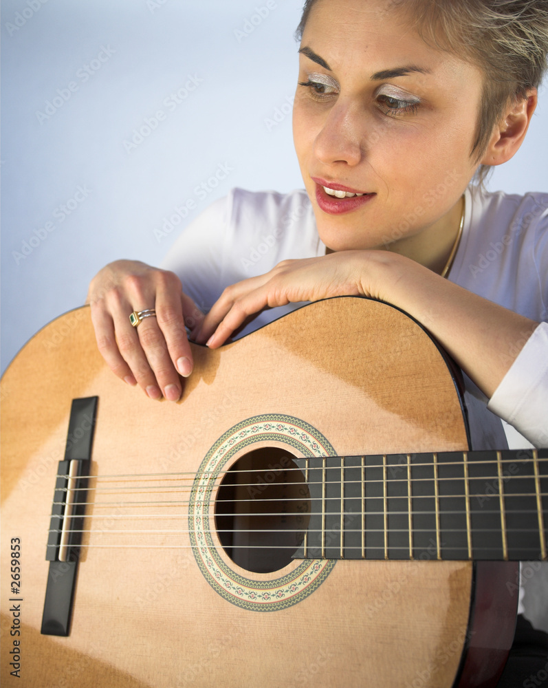 Fototapeta premium woman and guitar
