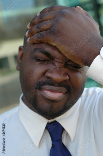 man slapping his head photo