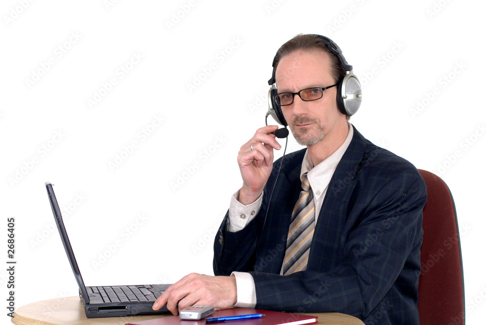 businessman making internet conference call businessman making internet conference call