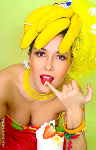 banana lady tasting a cream strawberry cocktail