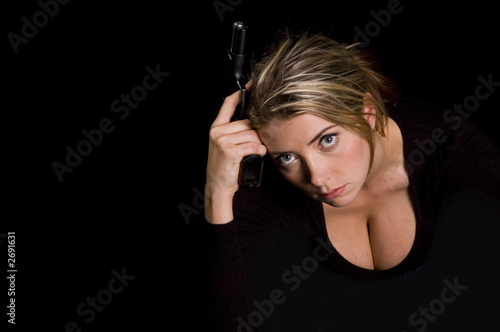 sexy blond with semi-automatic handgun