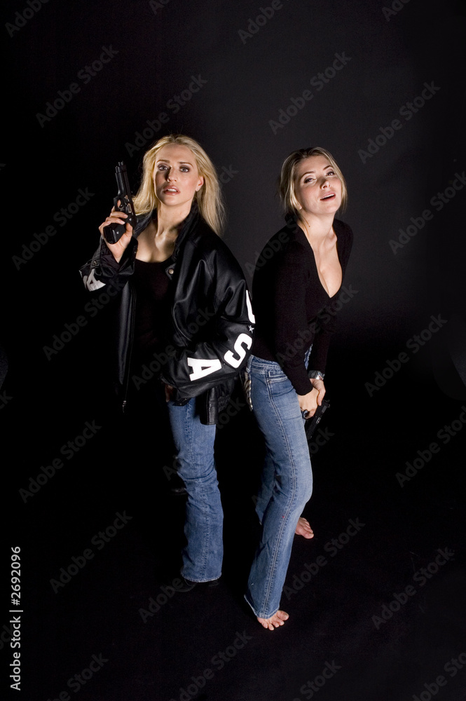 two woman with guns