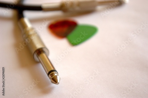 guitar picks and cable