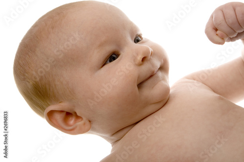 newborn baby making small fist