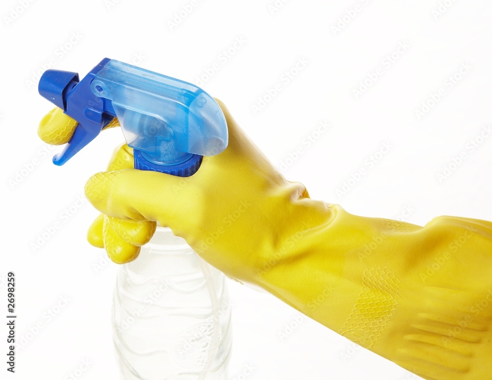 hand in yellow rubber glove with a spray 4 hand in yellow rubber glove with a spray 4