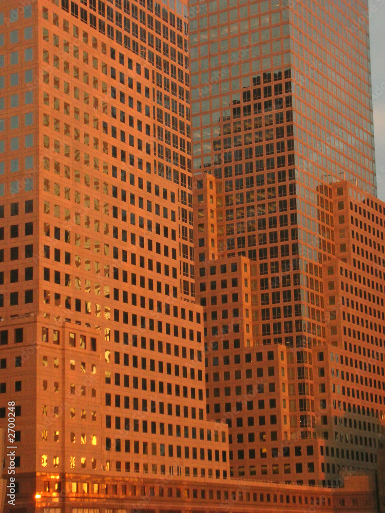 detail of windows of a brown business building tower, new york