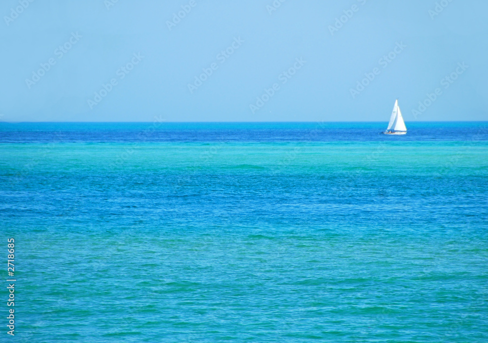 sailboat on turquoise sea