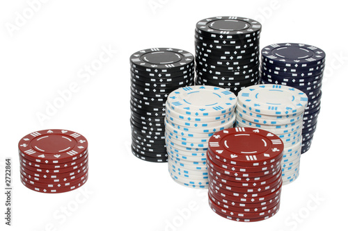 a large stack and a small stack of poker chips.
