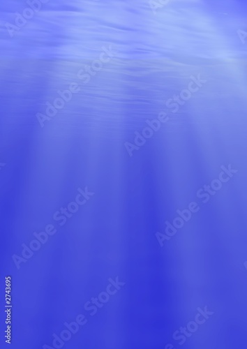 beams of the sun underwater - vertical photo