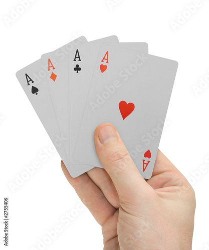 hand with playing cards (four aces)