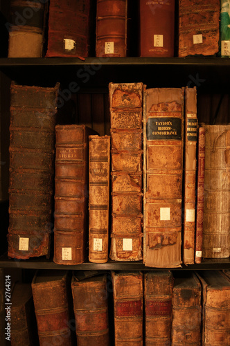 portrait image of books on a shelf