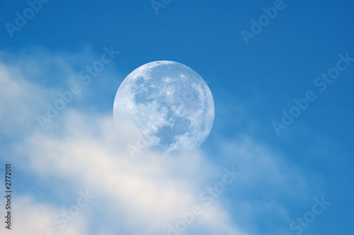 full moon in daylight photo
