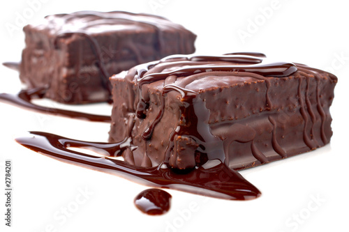 two chocolate cakes with syrup