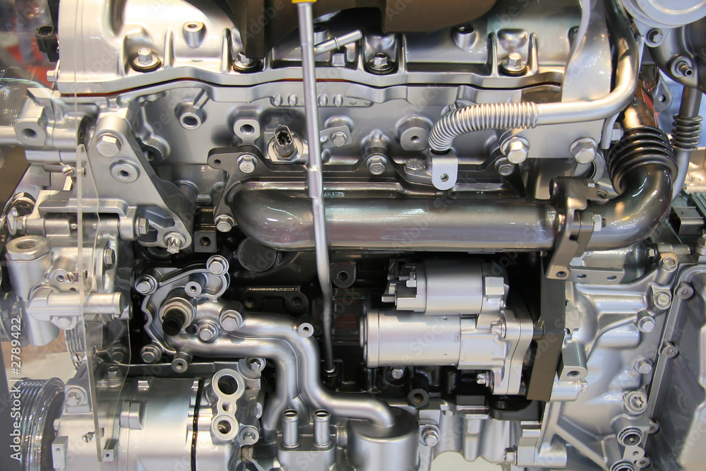 a part of new internal combustion engine by side a part of new internal combustion engine by side