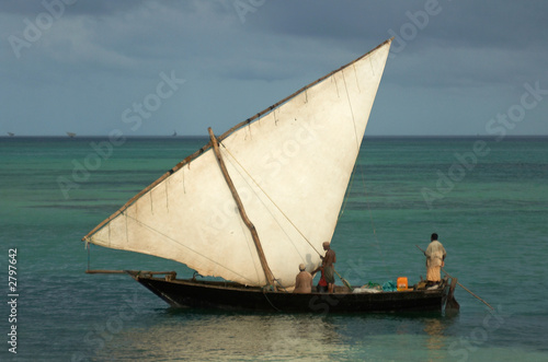 sailboat with three fishermans.