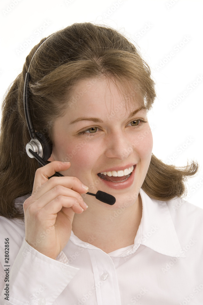female operator smiling holding mic on head set female operator smiling holding mic on head set