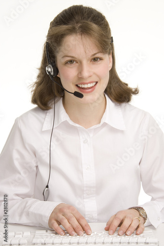 woman operator, keybording/typing with head phones