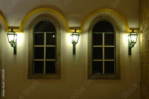 facade of windows and antique lanterns