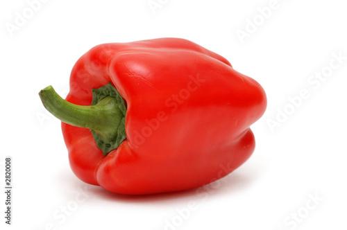 big red bell pepper isolated on white