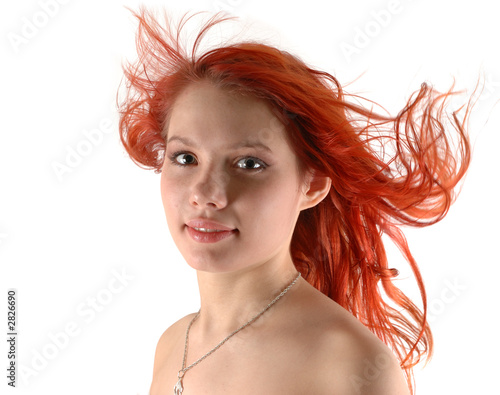 young girl in the wind looking forward - isolated