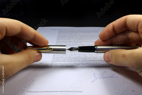 signing contract black background