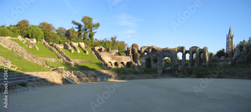 roman arena in saintes french city, france, panorama photo