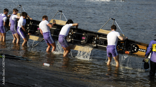 rowing crew pour off the water