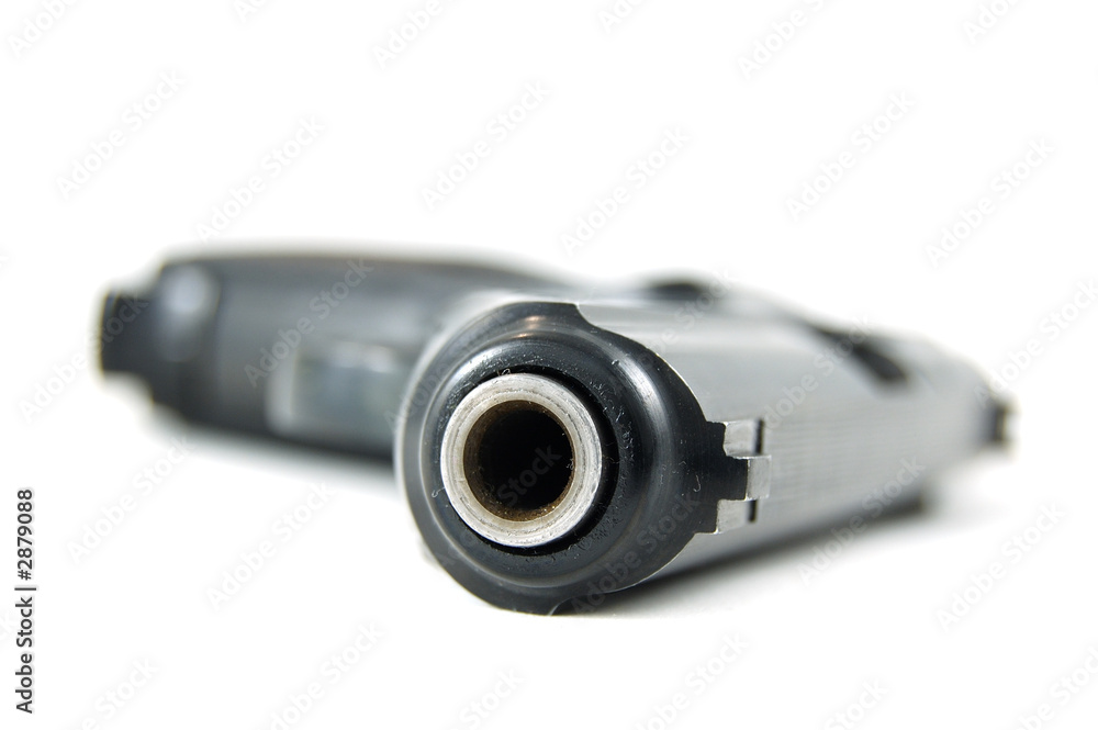 pistol on isolated( focus on the gunpoint ) pistol on isolated( focus on the gunpoint )