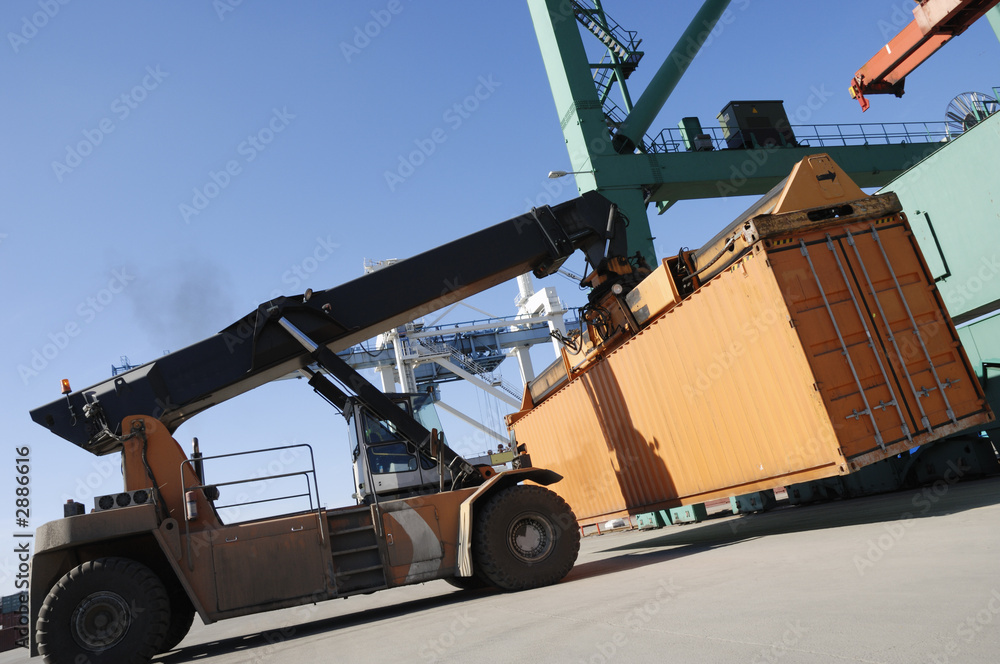 giant forklift lifting container
