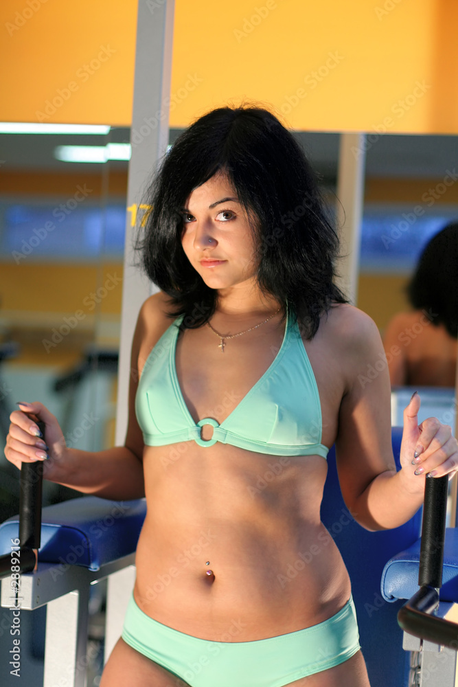 girl on exercise equipment girl on exercise equipment