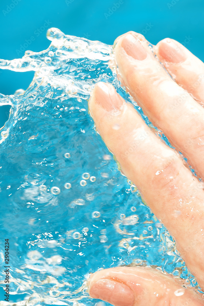 human hand with current water. human hand with current water.