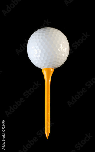 golf ball on yellow tee