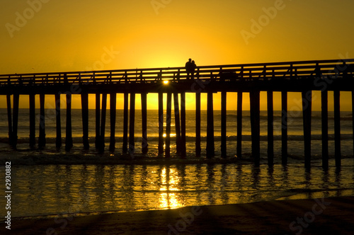a couple on a pier