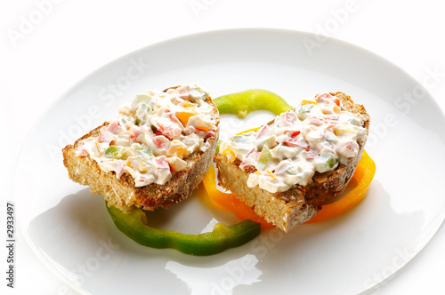 bread with cheese cream and vegetables