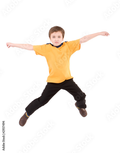 young boy jumping up