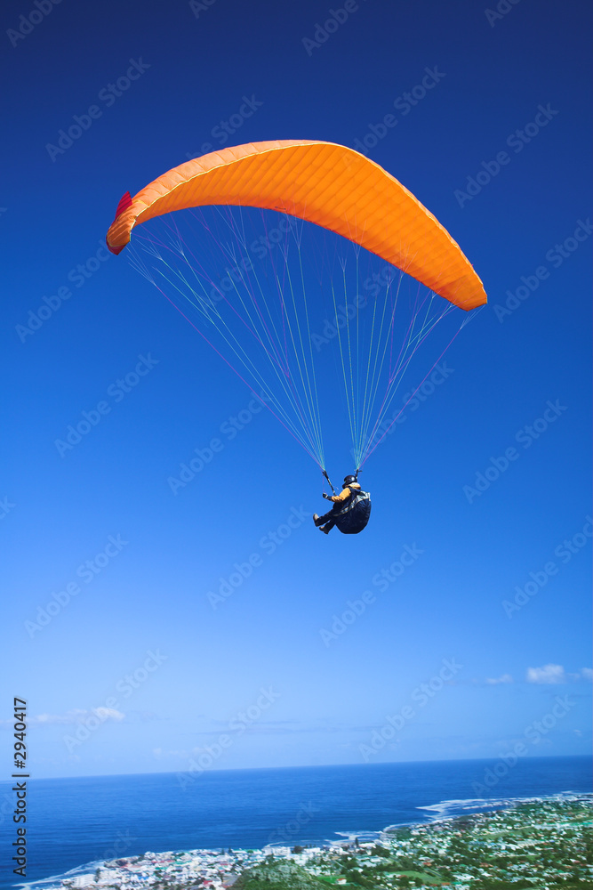 paraglider launching from the mountain ridge paraglider launching from the mountain ridge