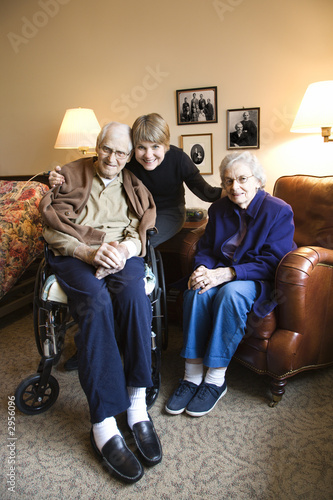 Middle-aged daughter with elderly mom and dad