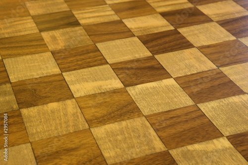 фотографія brown and tan checkered wooden floor.