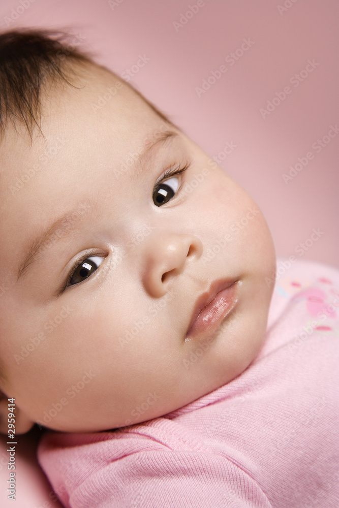 close up of babys face looking at viewer. close up of babys face looking at viewer.