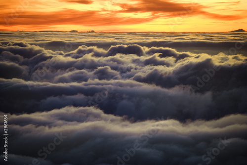 Sunrise over clouds in Haleakala, Maui, Hawaii.